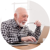 Older man looking at laptop
